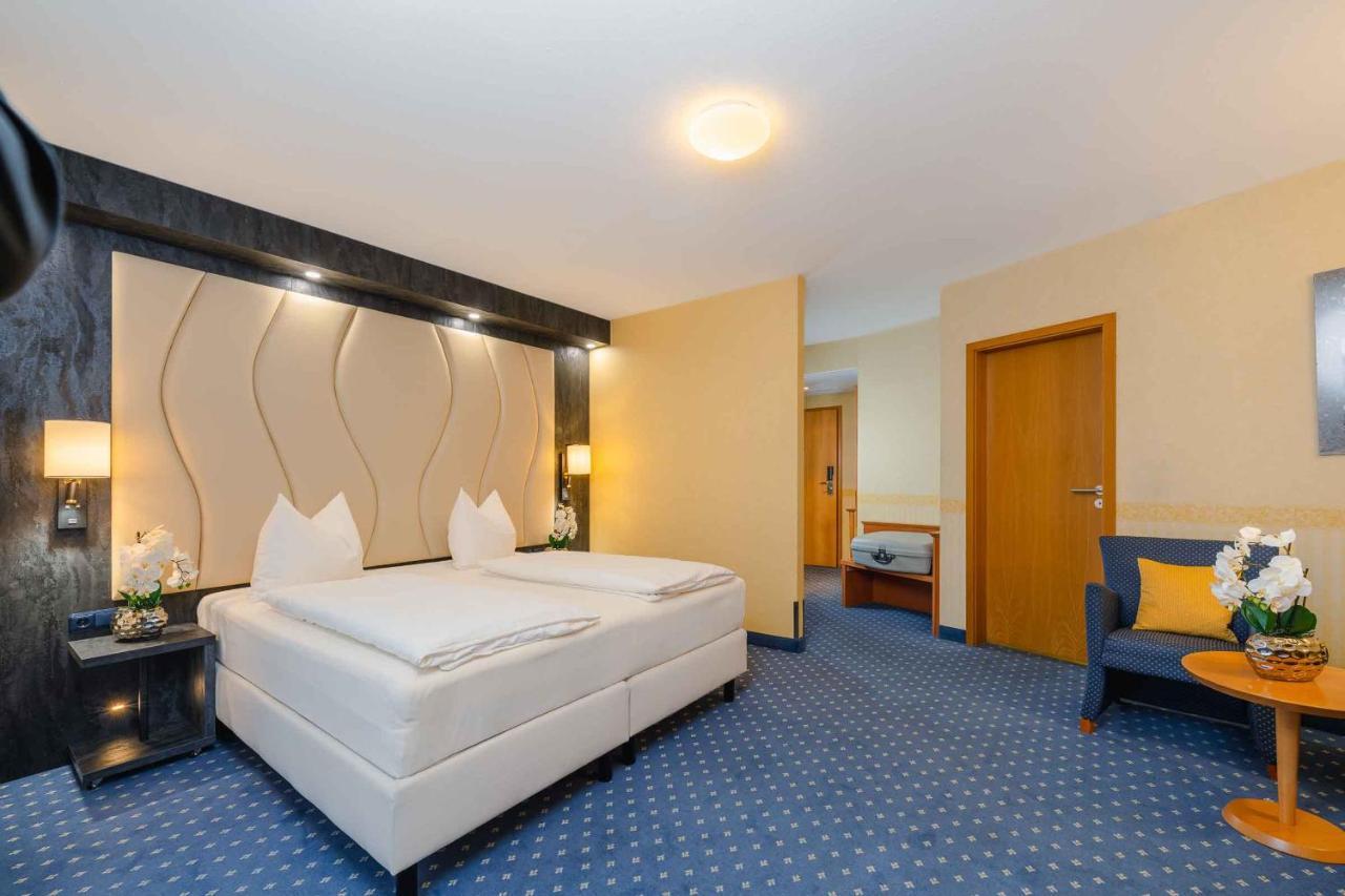 Plaza Inn Koeln Пульхайм Экстерьер фото