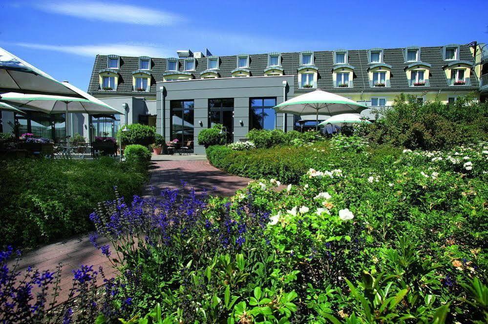 Plaza Inn Koeln Пульхайм Экстерьер фото